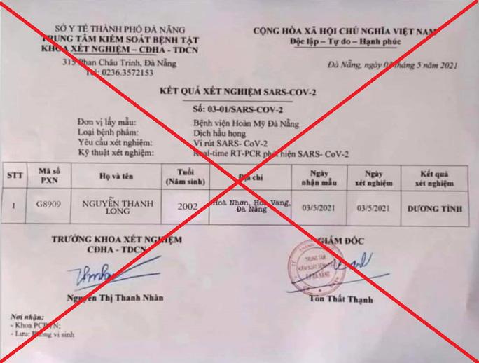 Triệu tập đối tượng làm giả giấy xét nghiệm dương tính Covid-19 tại Đà Nẵng - Ảnh 1. Triệu tập đối tượng làm giả giấy xét nghiệm dương tính Covid-19 tại Đà Nẵng - Ảnh 1.
