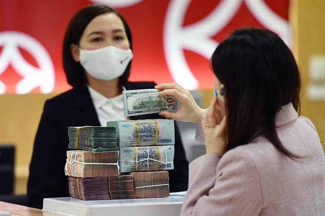 Cuộc đua xuống đáy của phí giao dịch ngân hàng ảnh 1