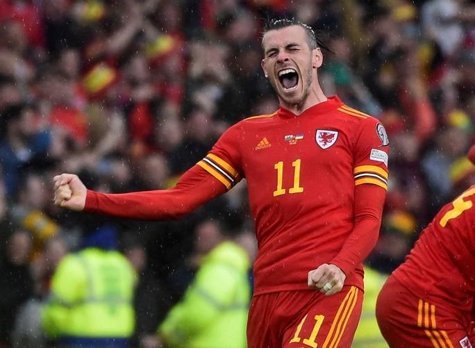 Đá phản ngỡ ngàng, Ukraine mất vé World Cup vào tay Xứ Wales - Ảnh 5.