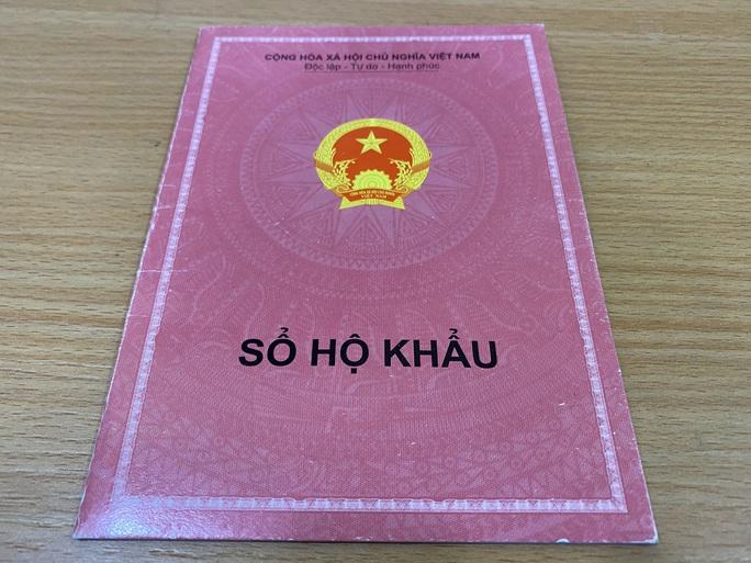 Chính phủ chỉ đạo thực hiện quy định bãi bỏ yêu cầu xuất trình sổ hộ khẩu - Ảnh 1.