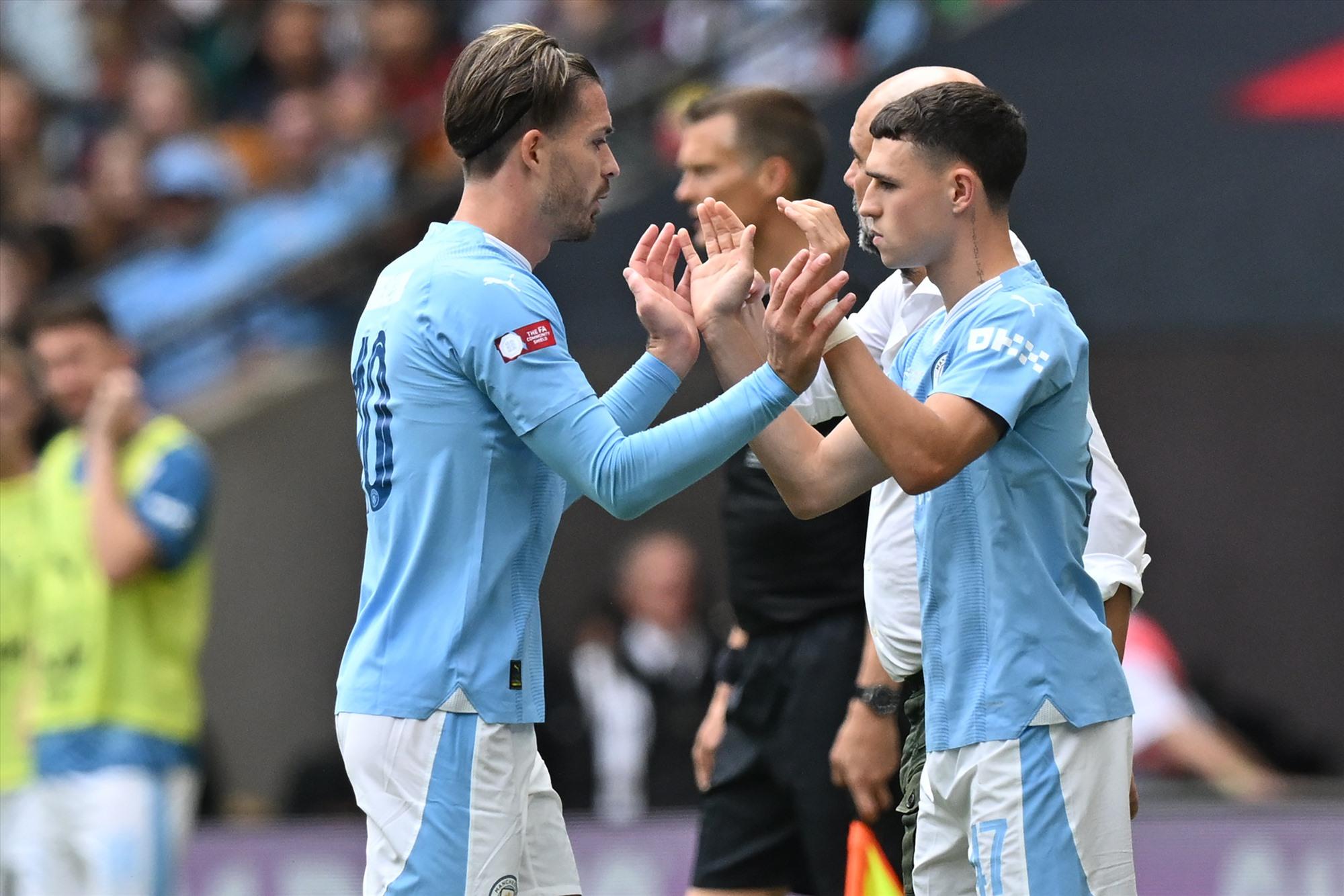 Giữa Phil Foden và Jack Grealish có sự cạnh tranh vị trí rất khốc liệt. Ảnh: AFP