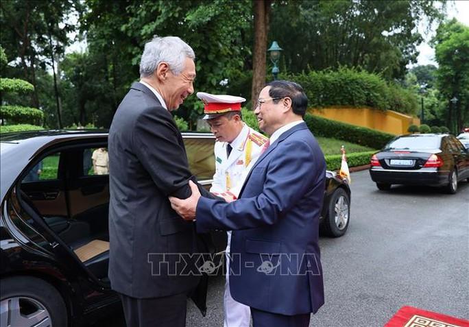 Thủ tướng Phạm Minh Chính chủ trì Lễ đón Thủ tướng Singapore Lý Hiển Long - Ảnh 3.