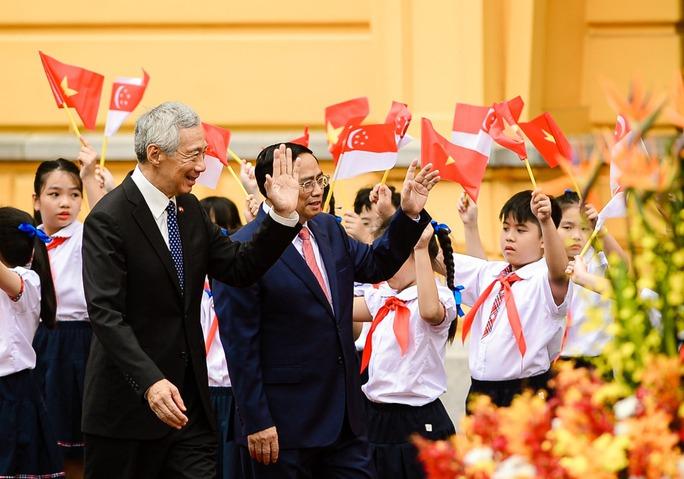 Thủ tướng Phạm Minh Chính chủ trì Lễ đón Thủ tướng Singapore Lý Hiển Long - Ảnh 4.