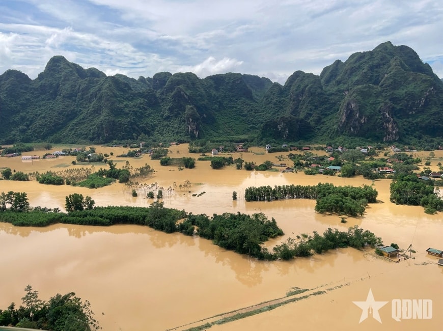 Mưa lớn khiến nhiều tỉnh miền núi ngập lụt (ảnh: Báo QĐND).